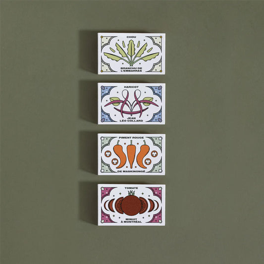 Quatre (4) petite boites de semences illustrées avec la variété qu'elles renferment.