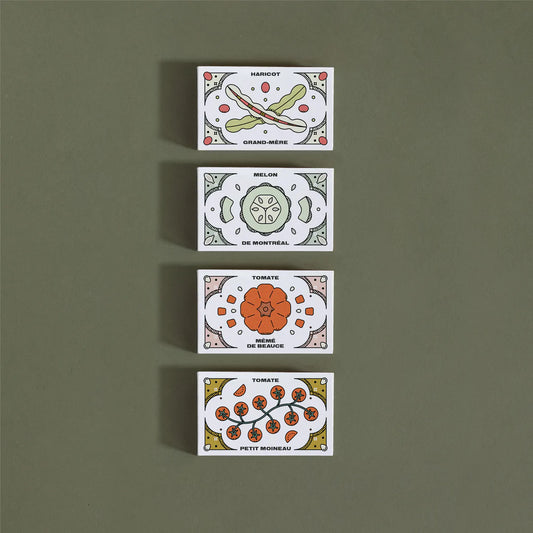 Quatre (4) petites boites, chacune illustrée avec la variété de semences qu'elle contient.