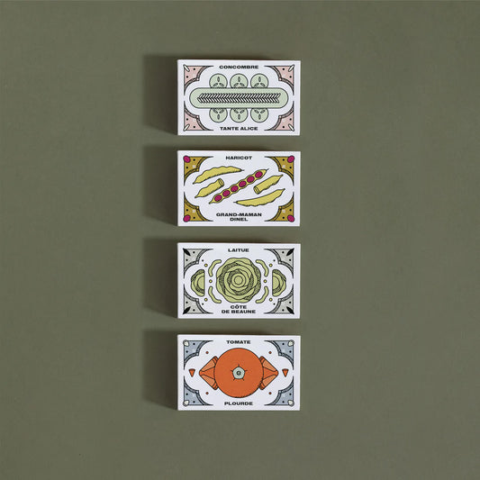Quatre (4) petites boites, chacune illustrée avec la variété de semences qu'elle contient.