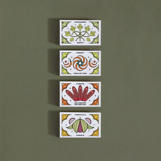 Quatre (4) petites boites illustrées avec la variété qu'elle renferme.