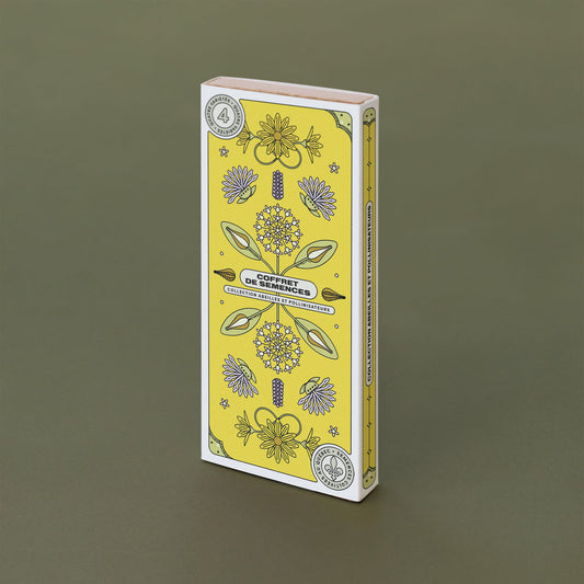 Boite rectangulaire jaune avec des dessins des variétés de végétaux qu'elle renferme. On peut lire : « Coffret de semences : collection abeilles et pollinisateurs ».