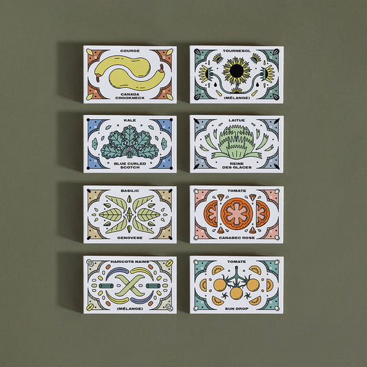 Huit (8) petites boîtes rectangulaires, cahcune représentant un légumes ou une fleur différente.